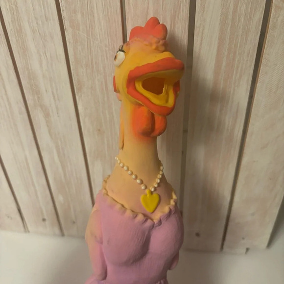 Lady squeaking chicken - Picture 4 of 6